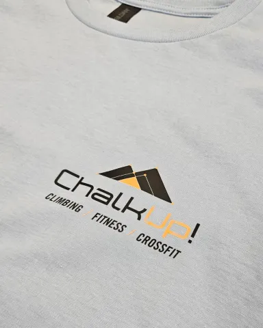 Light blue t-shirt showing ChalkUp! logo in black and orange